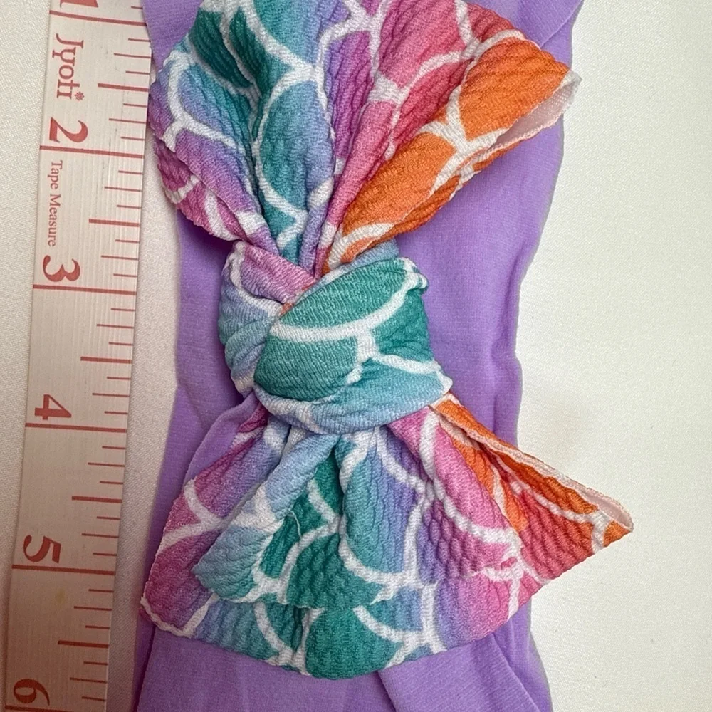 Vibrant Purple and Orange Hair Bow Accessory